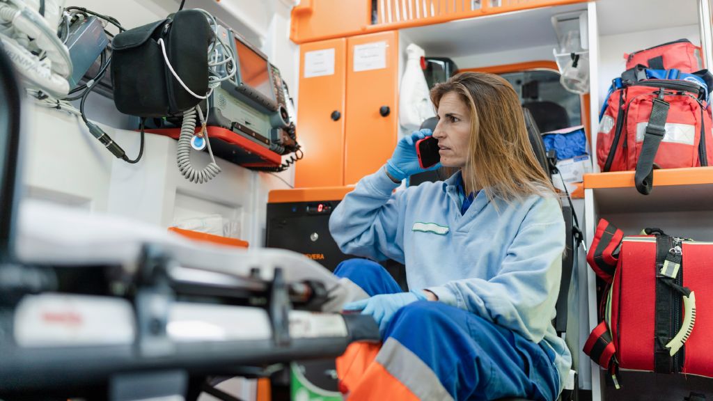 Paramedic on the phone Paramedic on the phone