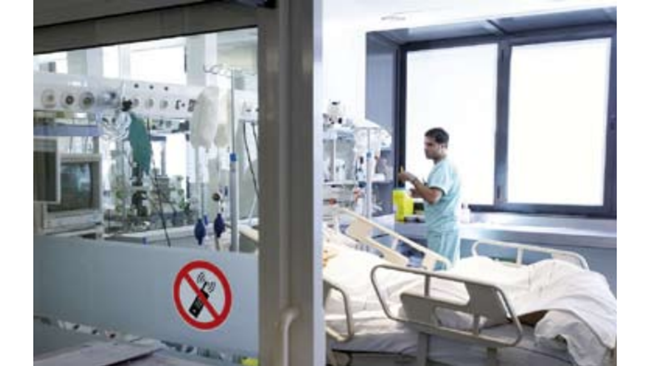 Automatic monitoring of radio signals interfering with sensitive devices in hospitals Automatic monitoring of radio signals interfering with sensitive devices in hospitals